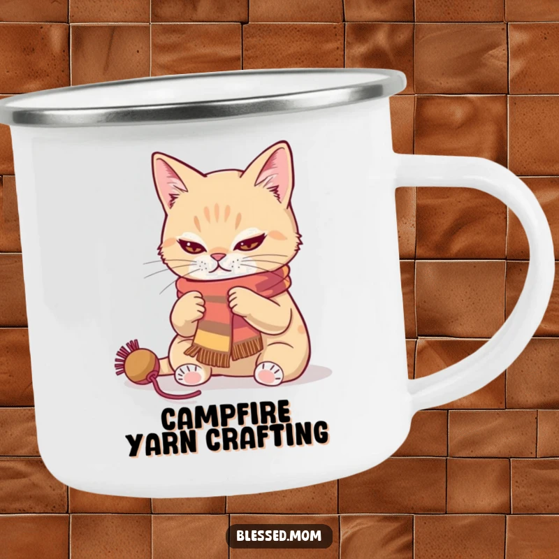 Funny cat knitting a scarf camping mug with a determined look, ideal for outdoor crafting sessions.