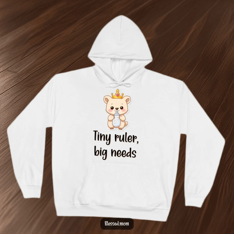 Funny Hoodie: A proud, crowned baby animal cradles a baby bottle, symbolizing the funny, regal challenges of parenthood.