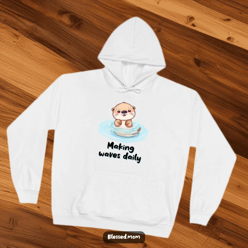 Funny otter mom hoodie, a cheerful mama otter splashing playfully in a sparkling pool, perfect for comfort and fun.