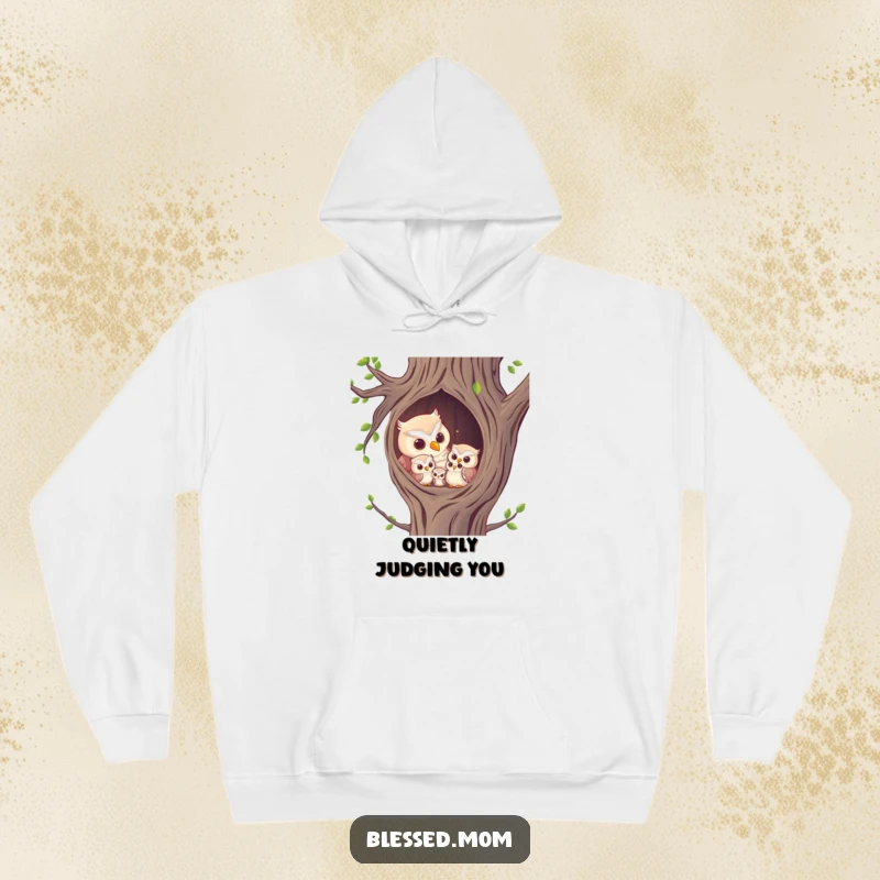 Funny Hoodie: A tender owl mom softly hooting to her owlets in their snug tree hollow home.